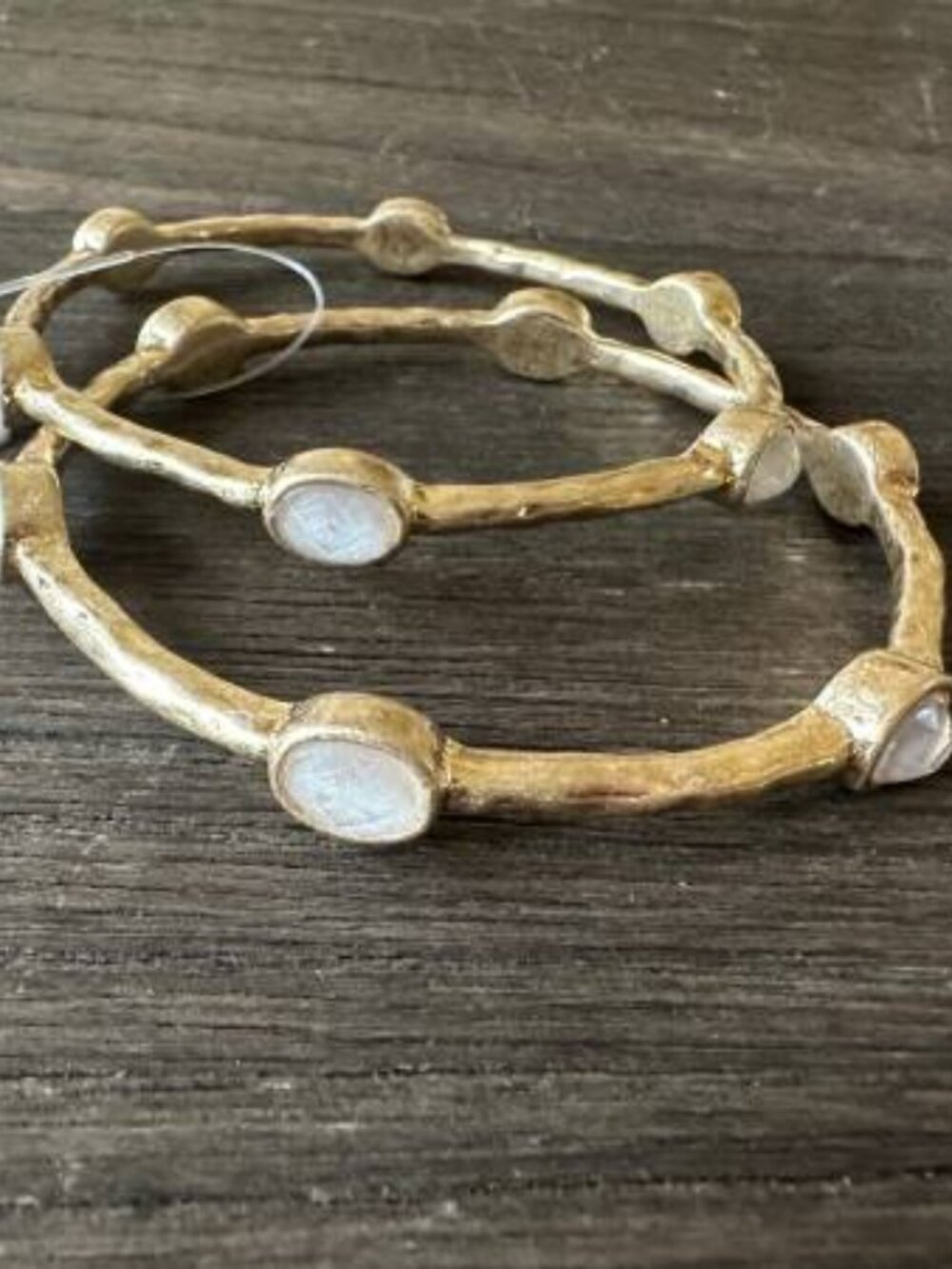 Hammered gold bangle bracelets with white faceted stones- New